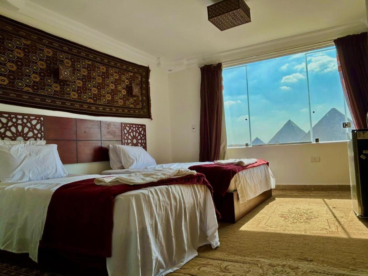 Отель Oscar Pyramids View Nazlet el-Sisi Номер фото