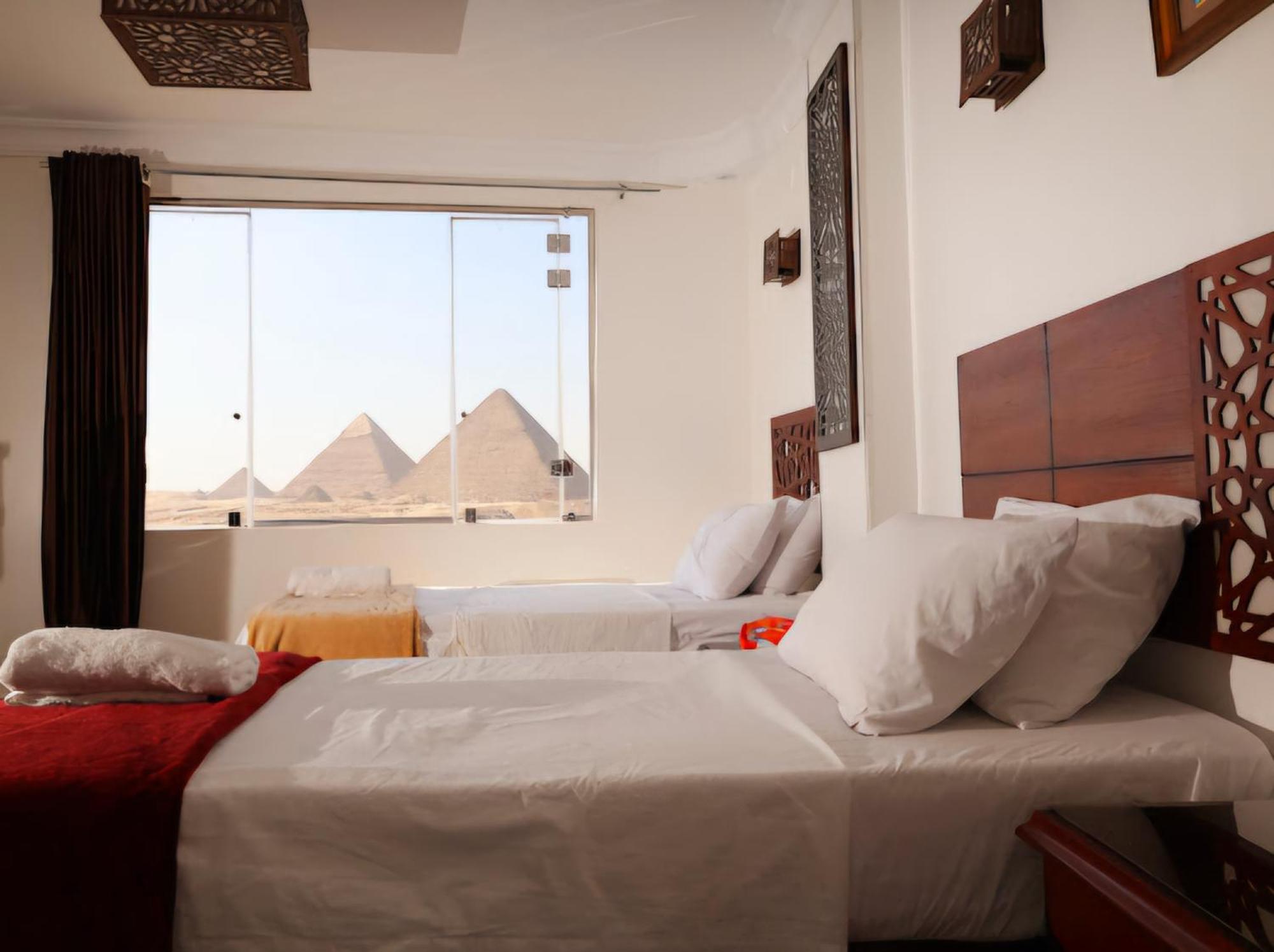 Отель Oscar Pyramids View Nazlet el-Sisi Номер фото