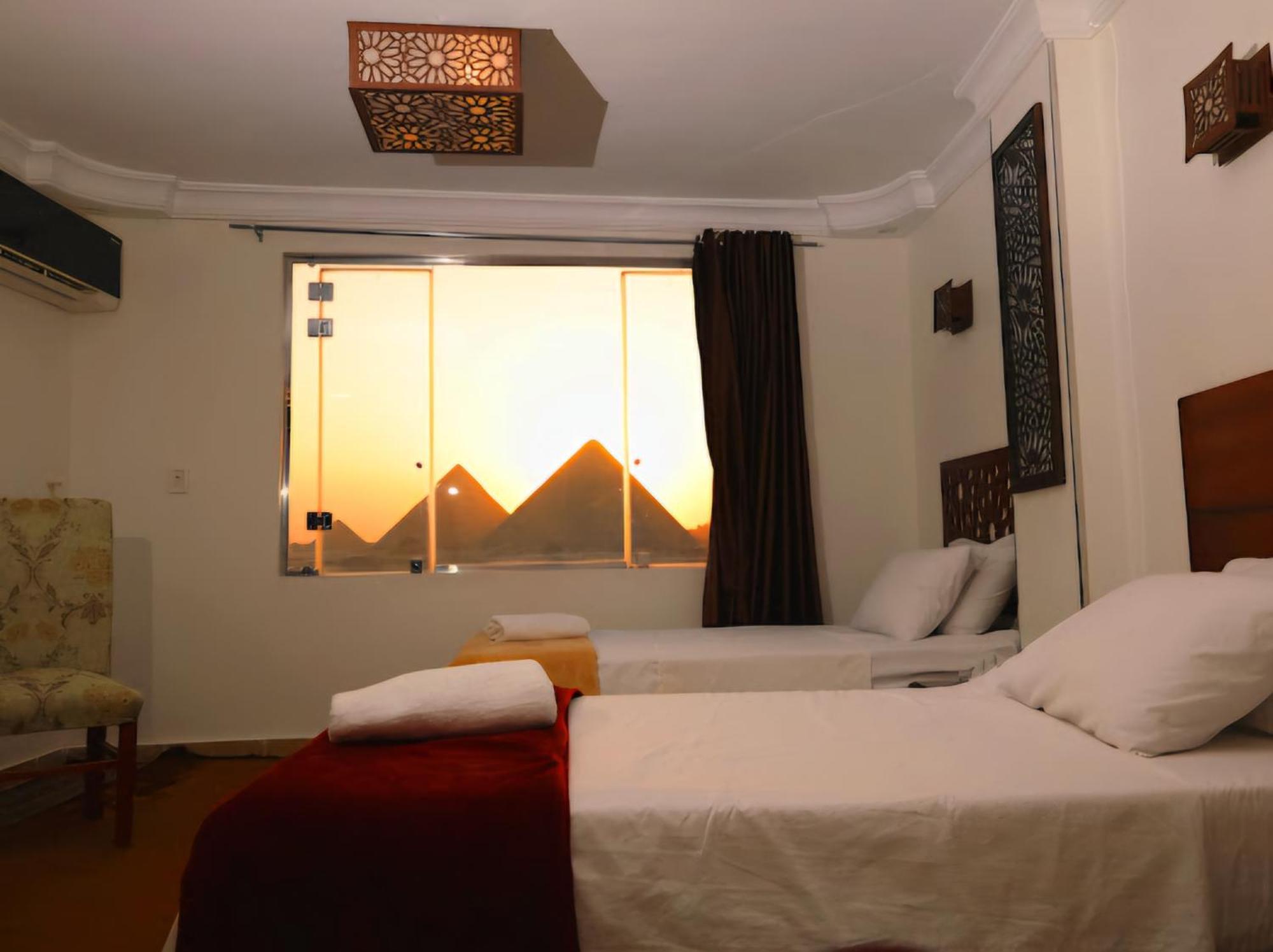 Отель Oscar Pyramids View Nazlet el-Sisi Номер фото